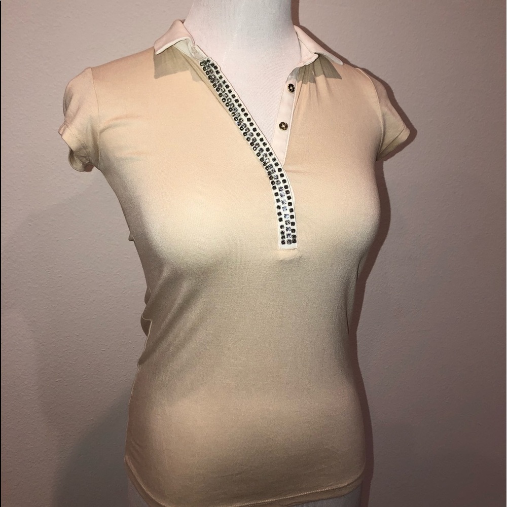 Short sleeved button down blouse. Size XXS Petite.